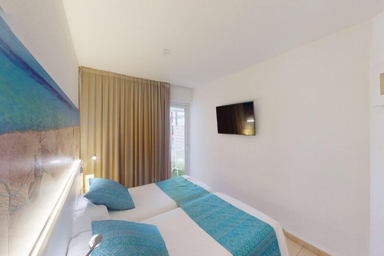 Aparthotel Tropic Garden Санта-Еулалія-дель-Ріо Екстер'єр фото